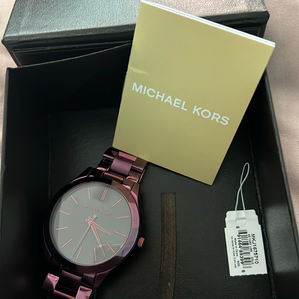 Purple (egg plant) Michael Kors watch.